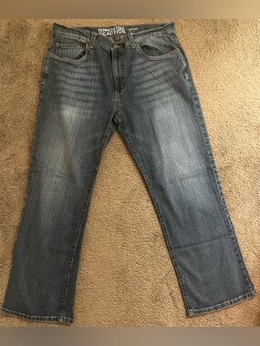 Kenneth Cole Reaction Men's Faded Blue Bootcut Jeans